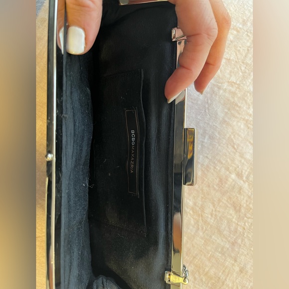 BCBG Max Azria Black satin purse with silver chain. - Picture 2 of 3